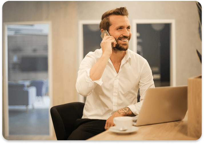 Man smiling with phone